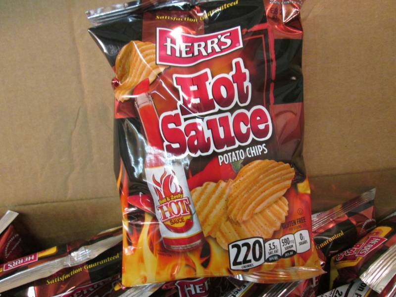 lot 196 image: Case of 30 Bags of Herrs Hot Sauce...