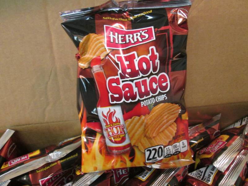 lot 197 image: Case of 30 Bags of Herrs Hot Sauce...