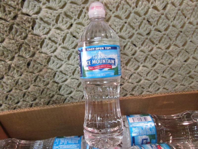 lot 214 image: Box Full of 29 Bottles of 23.7 ounc...