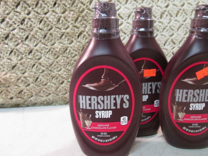 lot 230 image: 4 Bottles of Hersheys Chocolate Syr...