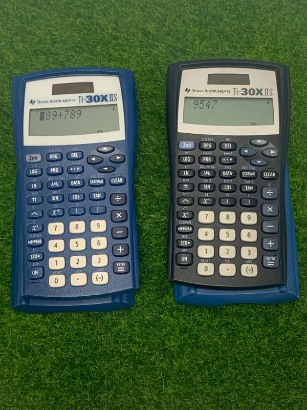 lot 10 image: Lot of 2 Texas Instrument TI-30x115 Scientific Calculators