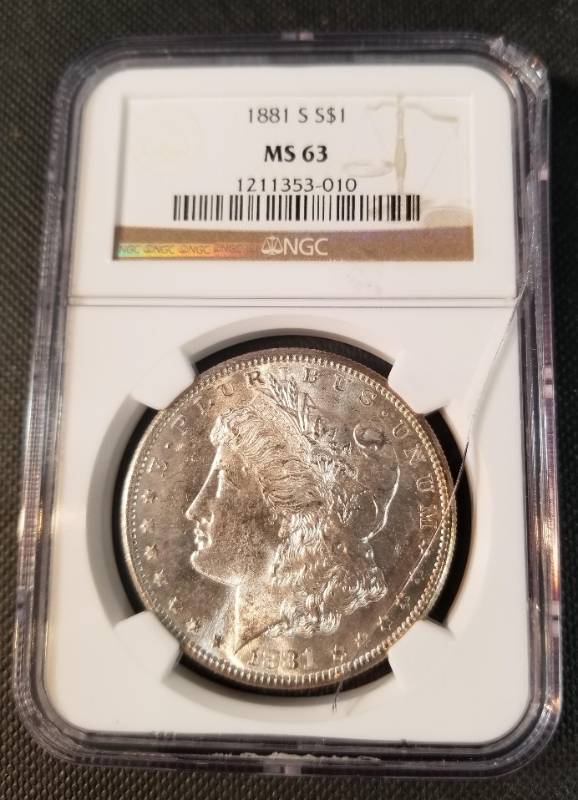 1881-S MORGAN SILVER DOLLAR MS63 NGC CRACK IN SLAB