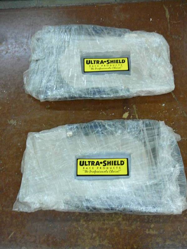 lot 48 image: New Pair Of Ultra-Shield Leg Supports PaddedRace Products