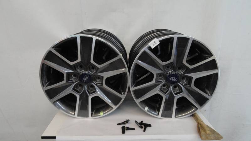 lot 34 image: 18 Ford F150 6 Hole Alum Wheels