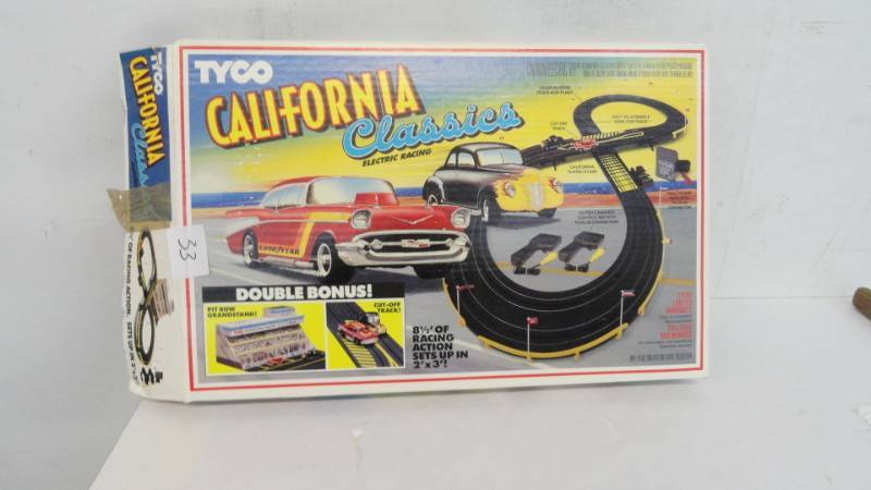 lot 33 image: TYC Electric Racing Race Car Track With Cars & Train Set