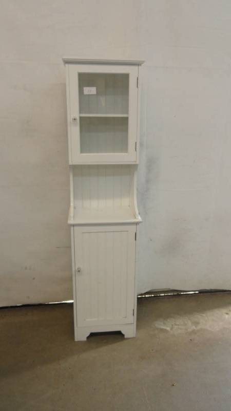 lot 11 image: White Cabinet With Doors