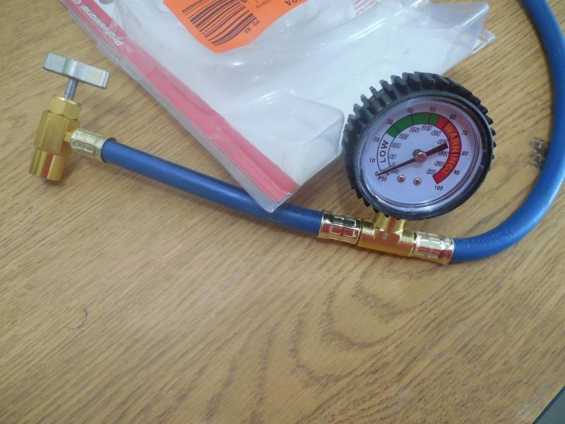 lot 97 image: AC Pro 24 in. R-134 Heavy Duty Charging Hose with Low Pressure Gauge