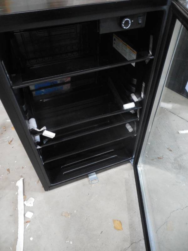 lot 14 image: Haier 21 Inch Freestanding Beverage Center with 150 Can Capacity, Full-Width Glass Shelving, Security Lock, Recessed Handle and Reversible Door