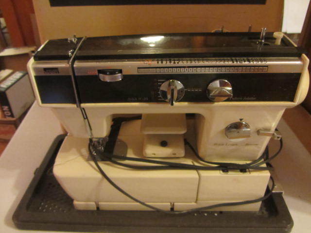 lot 74 image: MW Portable Sewing Machine
