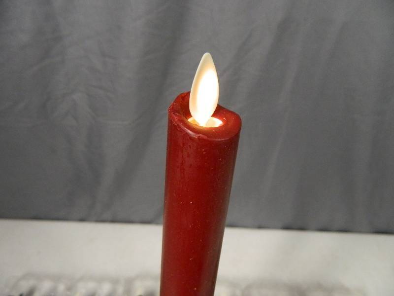 lot 199 image: 12 Luminara Flameless Candles