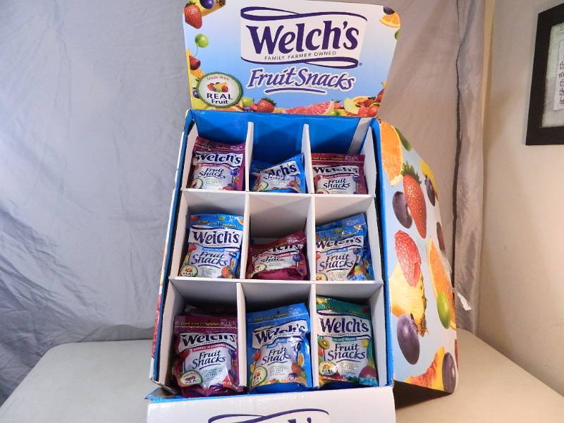 lot 125 image: New Display with 54 Bags of Welches Fruit Snacks