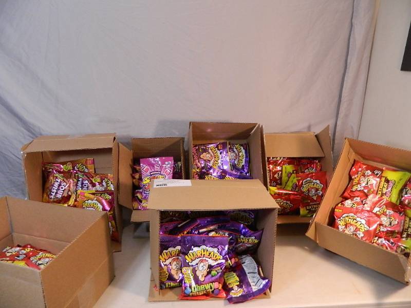 lot 162 image: 7 New Cases of Assorted WarHeads, HotHeads, and Sour Jacks Candy