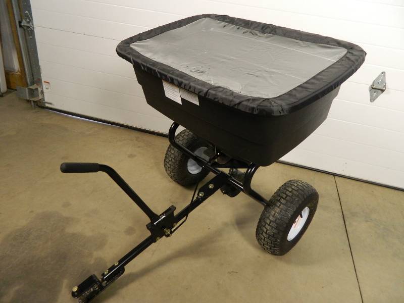 lot 19 image: New 200 lb Lawn  Salt Spreader