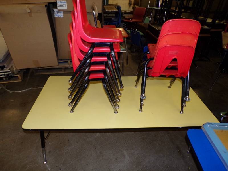lot 28 image: Childs Yellow table with 8 orange chairs