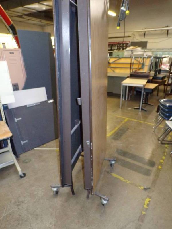 lot 56 image: Folding table on wheels