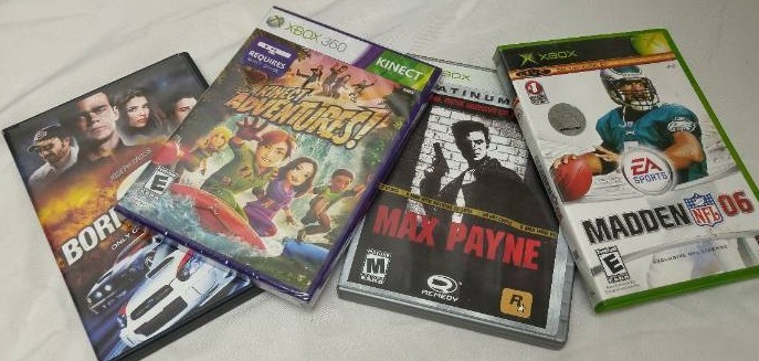 lot 44 image: New X-Box Game (1) VHS and DVDs Lot