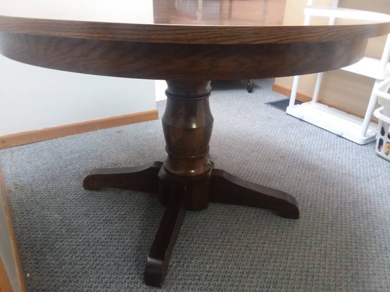 lot 3 image: 48 in. Round Dining Table with 6 chairs.
