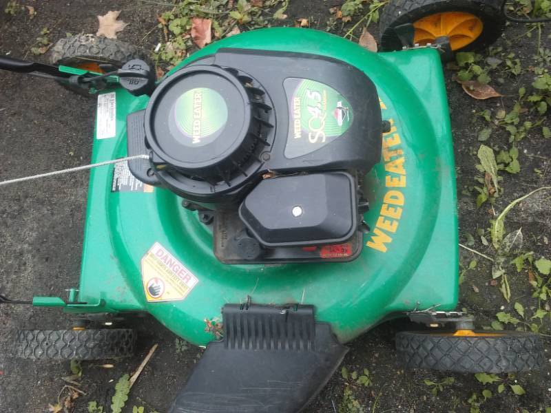 lot 203 image: Weed Eater Lawn Mower, 4.5 HP Briggs & Stratton