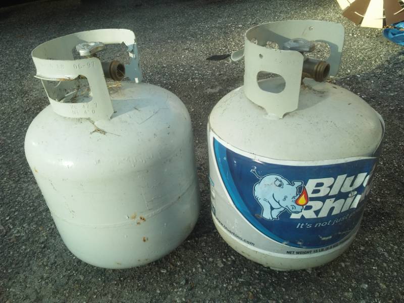 lot 214 image: Two Blue Rhino gas tanks - 20 lb. both have fuel.
