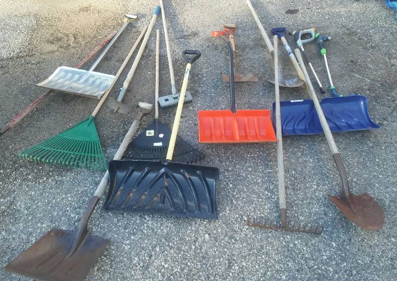 lot 217 image: Shovels, rakes, hoes, spray wands and more.