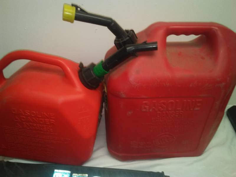 lot 66 image: 2 gas cans - 5  2.5 gallon and more.
