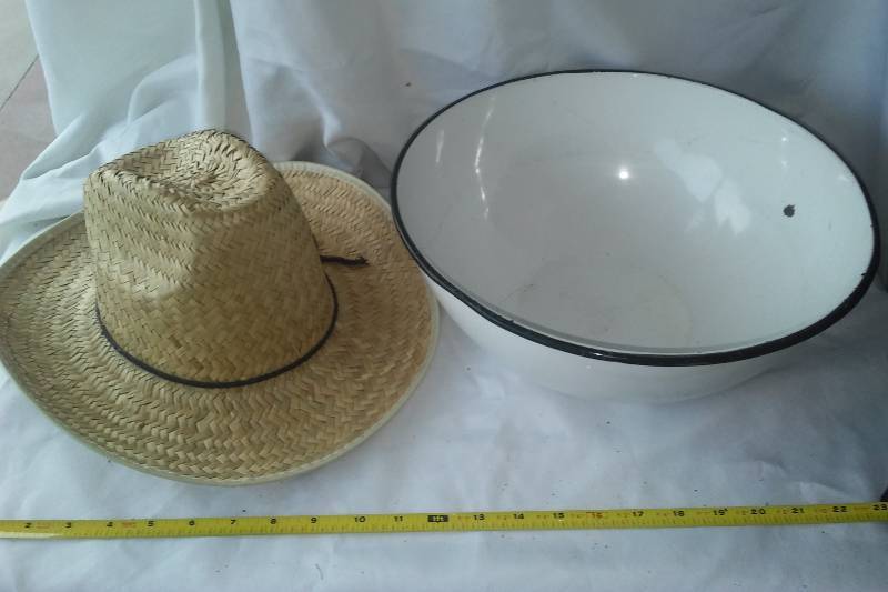 lot 241 image: Vintage enamelware and straw cowboy hat.