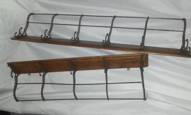 lot 300 image: 2 vintage wood and metal coat racks.