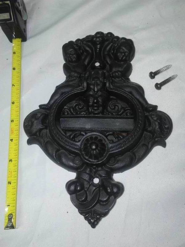 lot 345 image: Heavy cast door knocker.
