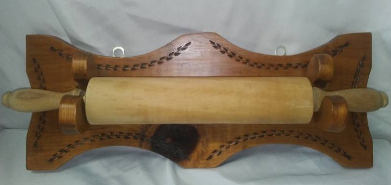 lot 353 image: Rolling pin and wall rack.
