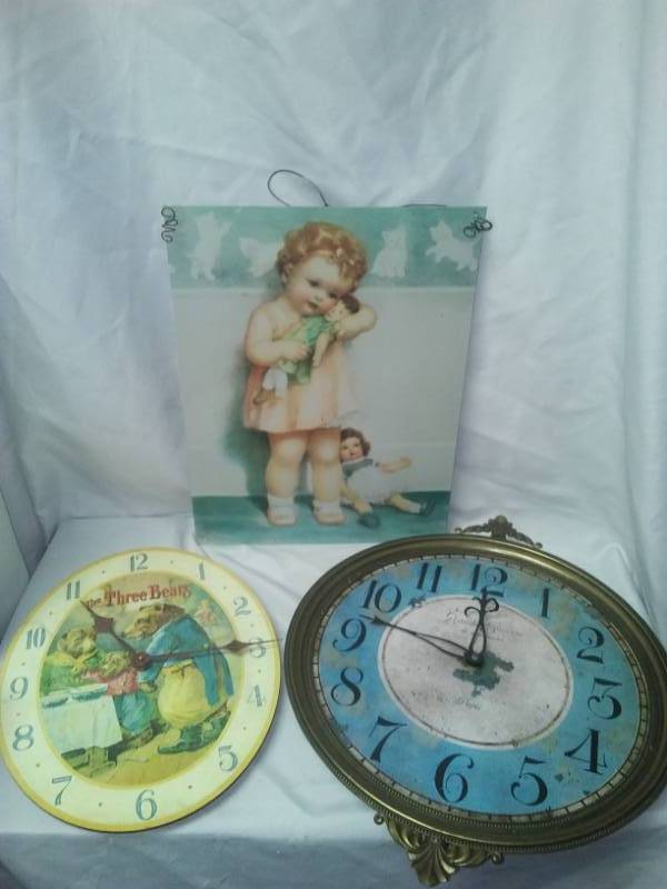 lot 396 image: Two clocks and a sign.