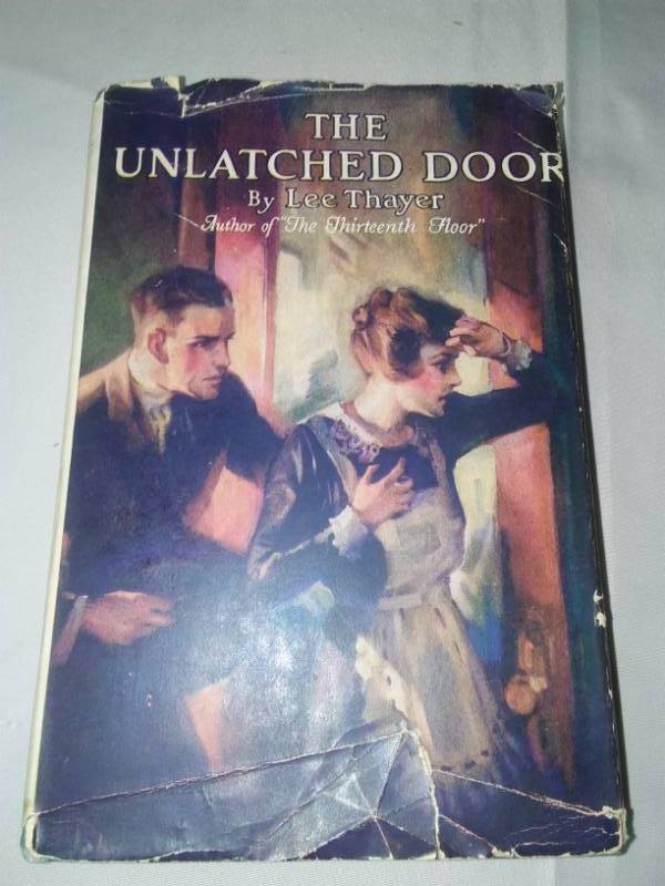 lot 439 image: The unlatch door by Lee Thayer 1920 - 1st edition.