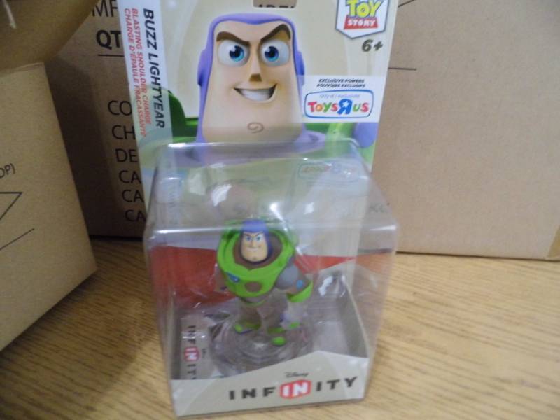 lot 91 image: Case of 24 Buzz Lightyear Figures