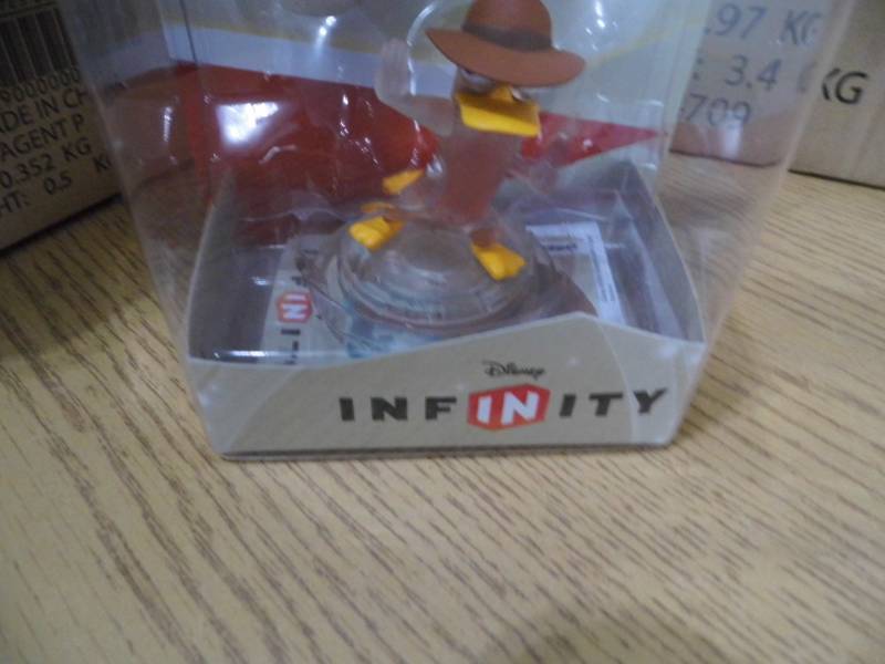 lot 92 image: Case of 24 Agent P Figures