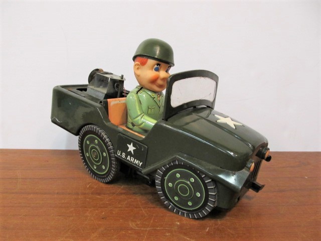 lot 63 image: Vintage Masudaya Japan Tin Litho Army Rocket Jeep
