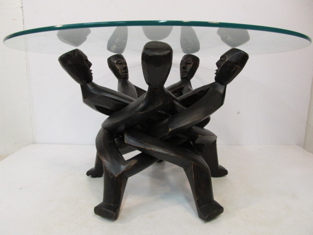 lot 66 image: Vintage Glass Top Table w Interlocking Wood Figure base