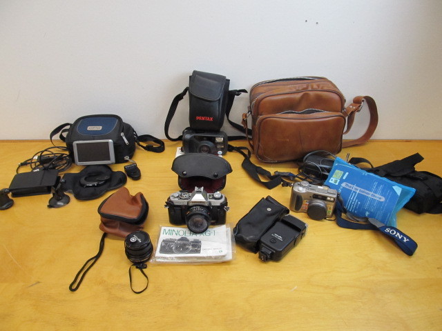 lot 12 image: Group of Cameras Accessories & GPS System