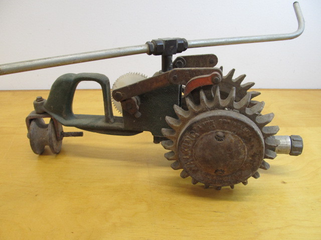 lot 160 image: Large Old Vintage Cast Iron Tractor Walking Sprinkler