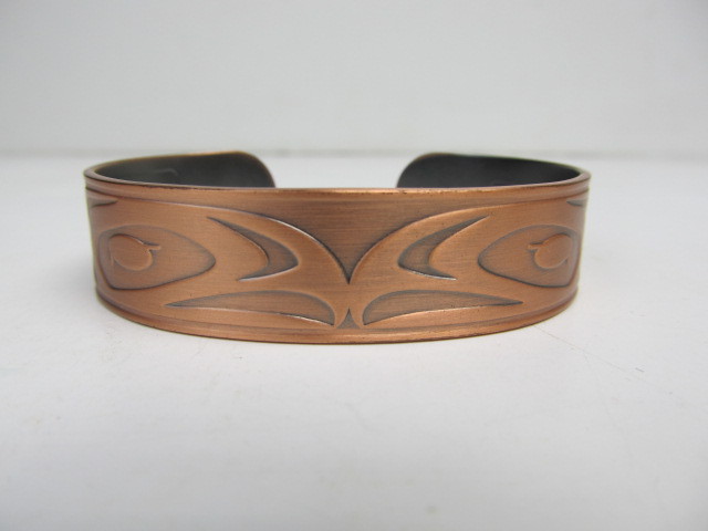 lot 109 image: Signed Native American Copper Bracelet by Daniel Yunkws