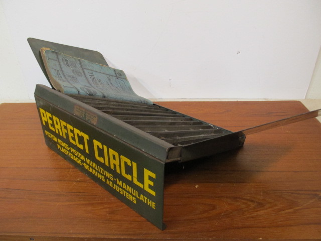 lot 85 image: Original 1930s Service Station PERFECT CIRCLE Piston Rings Advertising Catalog Display