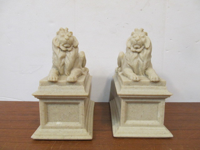 lot 139 image: New York Library Lion Bookends - Edward Clark Potter