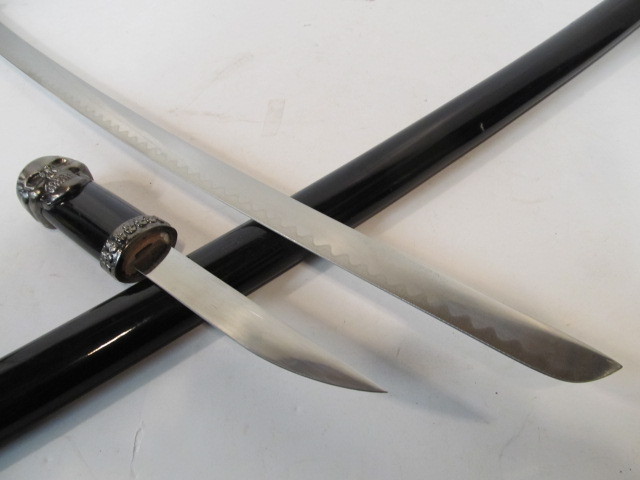 lot 144 image: Decorative Samurai Style Sword wSkulls