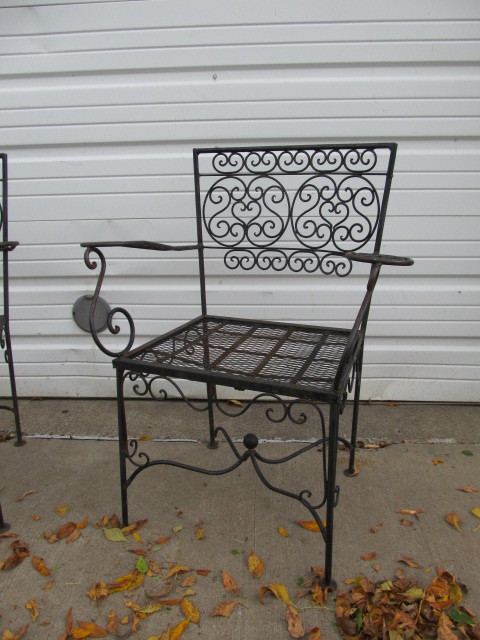 lot 252 image: Pair of Iron Spanish Revival Style Patio Chairs
