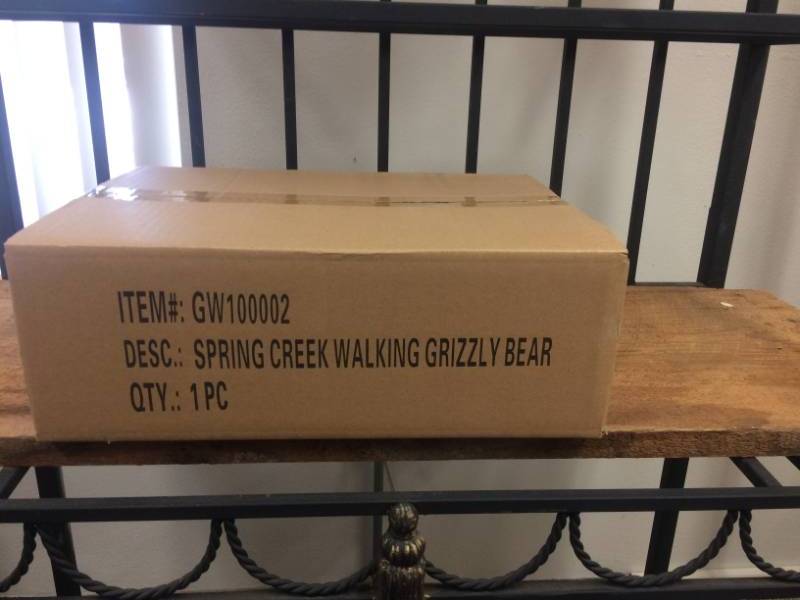 lot 31 image: Spring Creek Walking Grizzly Bear Figurine