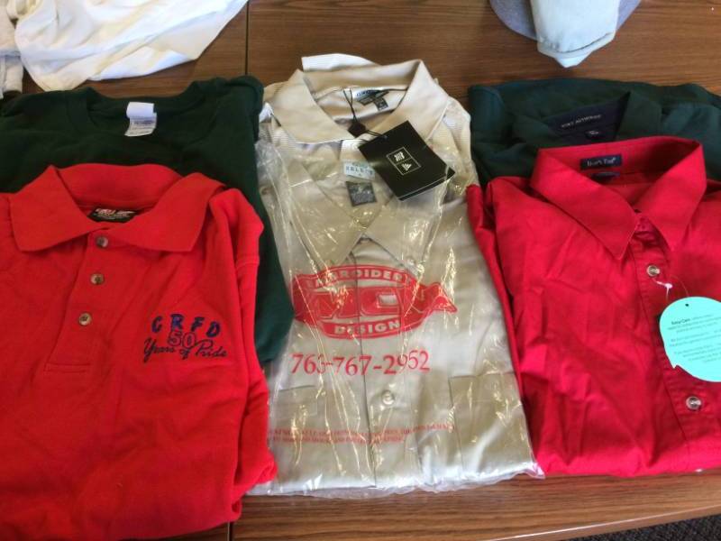 lot 91 image: Lot of Brand New Shirts of Various Sizes Polos Button Ups - See Pictures for sizes