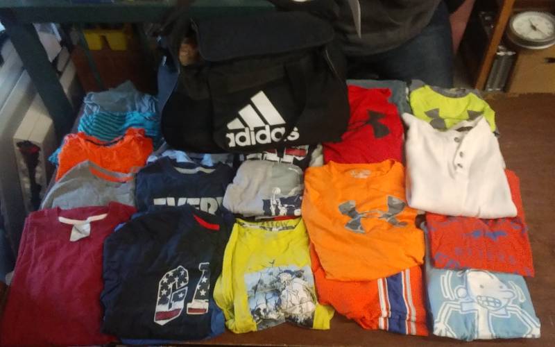 lot 15 image: Adidas Duffel Bag With Lot Of Boys Clothing (Youth Sz L)