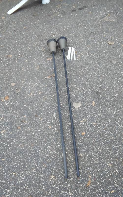 lot 48 image: 2-Tiki Torches With 4-Extra Wicks
