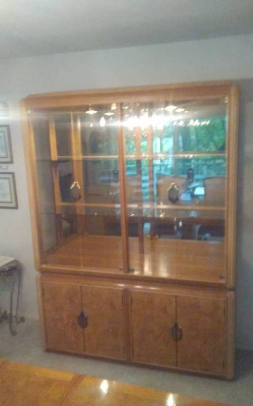 lot 52 image: Lighted 2 Piece Glass Hutch 60x19x80 By Hyundai Furniture