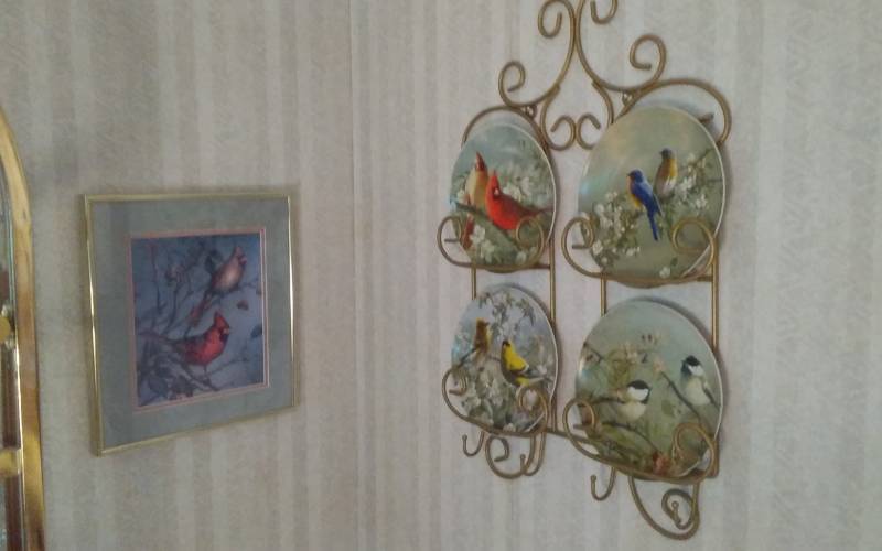 lot 87 image: 4-Piece Bird Plates (Hautman Bros.) With Rack 18x25. Includes Framed Cardinal Bird Picture 13x15 Signed By James Meger & Misc Bird Plates