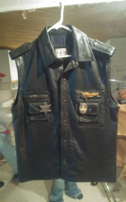 lot 178 image: Leather Sleeve Vest-Bagazio Size Small With Pins
