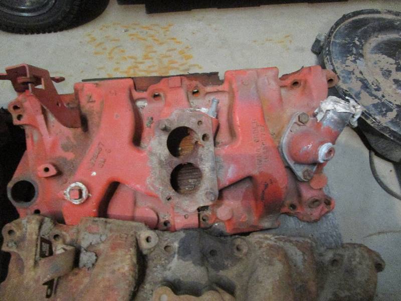 lot 39 image: (8) Small Block Chevy 2 Barrel Intakes